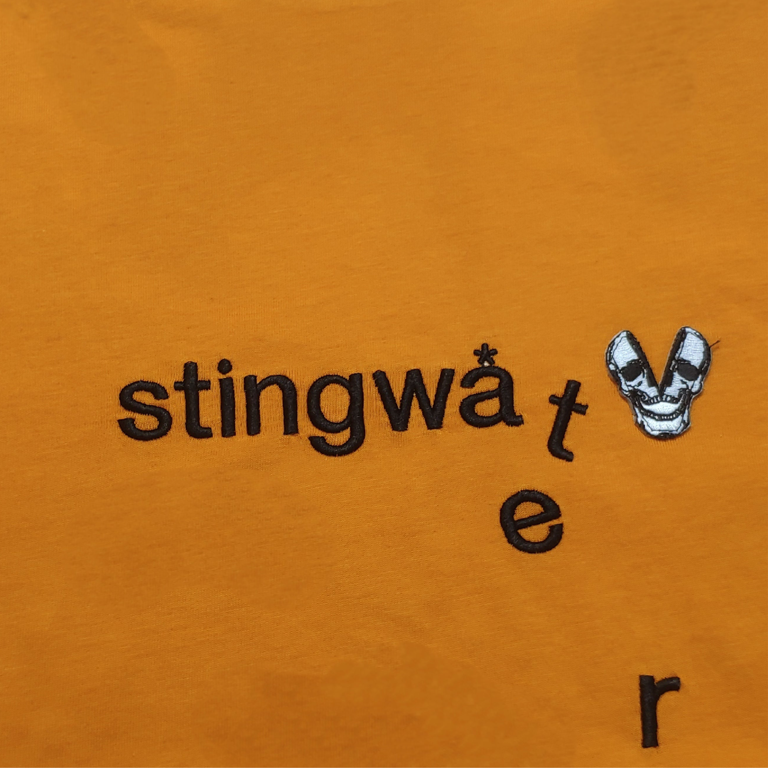 Classic melting logo and skull patch T Shirt Orange