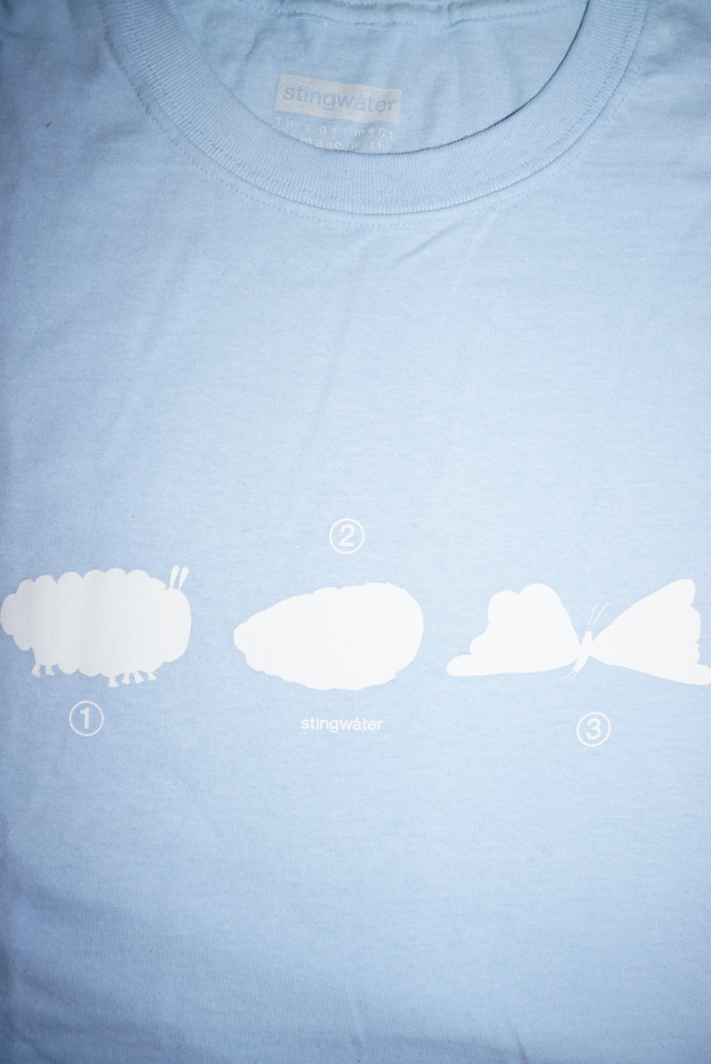 Metamorphosis T shirt sky blue