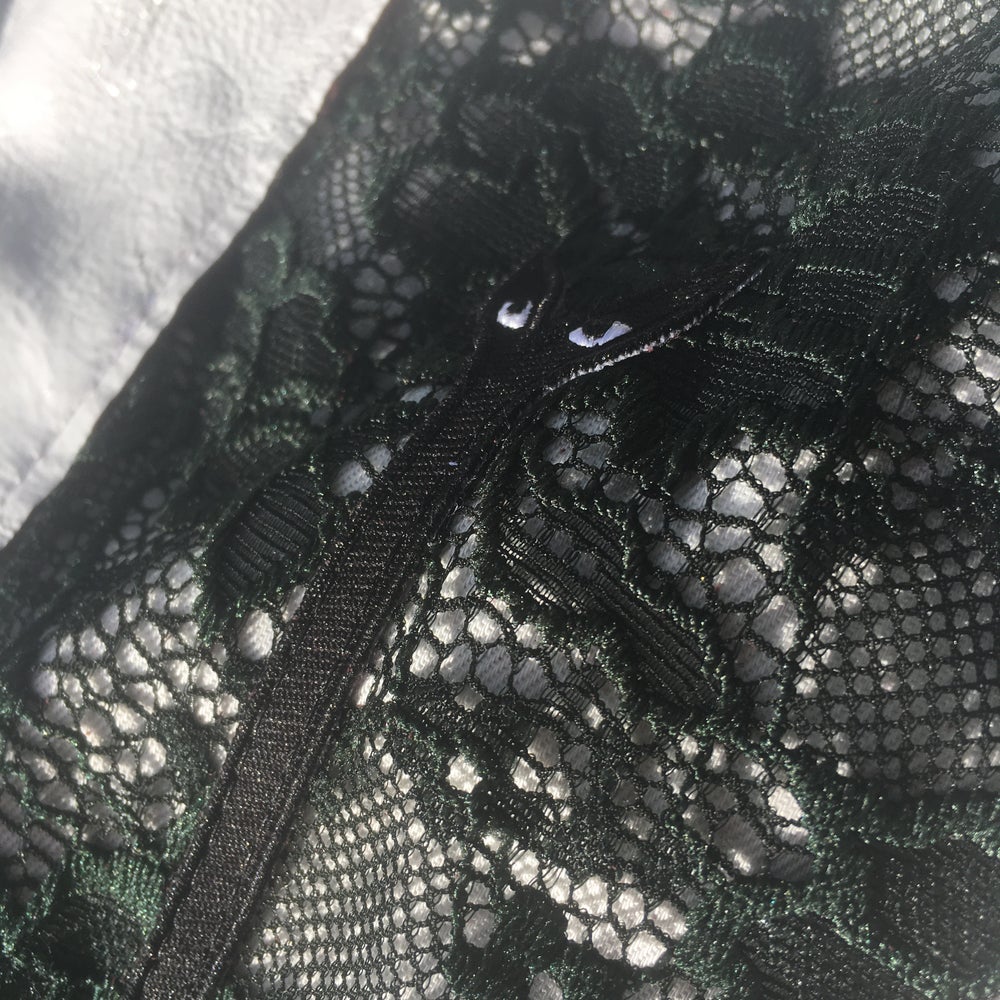 Black Aya white leather shorts